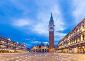 Piazza San Marco, often known in English as St Mark's Square, is the principal public square of Venice, Italy, where it is generally known just as la Piazza ("the Square"). The Piazzetta ("little Piazza/Square") is an extension of the Piazza towards San Marco basin in its southeast corner. The two spaces together form the social, religious and political centre of Venice and are referred to together when discussing Venice coffee