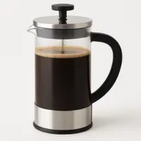 Ground coffee steeping in a French press with hot water just poured in