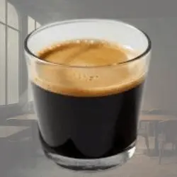 The Caffe Lungo sitting on a backdrop of a smokey Italian coffee shop